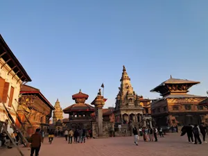 Explore the historic Patan Durbar Square, a UNESCO World Heritage site, at sunset. jigsaw puzzle