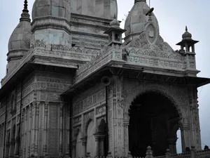 A captivating view of a historic temple showcasing its ornate architectural details and domes. jigsaw puzzle