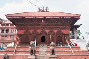 A detailed view of a historic temple in Kathmandu's Durbar Square featuring traditional architecture. jigsaw puzzle