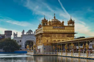 Stunning view of the Golden Temple in Amritsar, India, gleaming under the bright sky. jigsaw puzzle