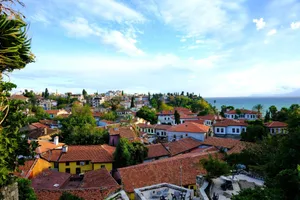 Explore the picturesque rooftops of Kaleici with a stunning view of the Mediterranean Sea. Perfect travel destination. jigsaw puzzle