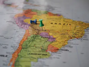 Close-up of a map of South America with pins marking locations in Brazil and Bolivia. jigsaw puzzle