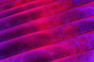Bright abstract texture with vibrant red and purple satin fabric folds. jigsaw puzzle