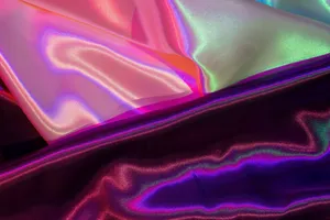 A captivating image of iridescent satin fabric showcasing vibrant gradient colors and luxurious texture. jigsaw puzzle