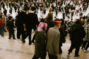 A bustling crowd descends city steps, highlighting diverse urban life. jigsaw puzzle