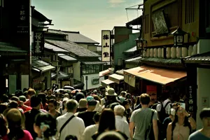 Busy pedestrian street in Kyoto, Japan, showcasing traditional architecture and vibrant life. jigsaw puzzle