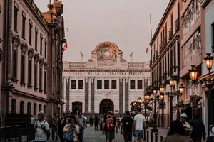 Evening scene outside the Casa de la Literatura Peruana in Lima with tourists and locals walking by. jigsaw puzzle
