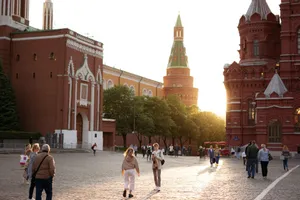 Sunset view of Red Square in Moscow capturing historic architecture and lively atmosphere. jigsaw puzzle