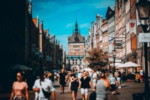 Vibrant street scene in Gdańsk's old town with people enjoying a sunny day in summer. jigsaw puzzle