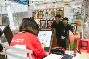 Street artist drawing a caricature for a couple at an outdoor art booth. Vibrant and lively scene. jigsaw puzzle