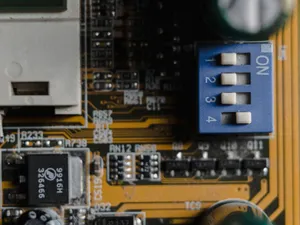 Detailed view of a circuit board showing switches and microchips. jigsaw puzzle