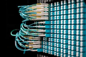 Server with electronic switches and connectors with yellow and green wires plugged in plastic device in operating room on black background jigsaw puzzle