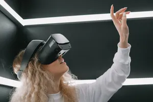 A woman wearing a headset engages with virtual reality, reaching out her hand. jigsaw puzzle