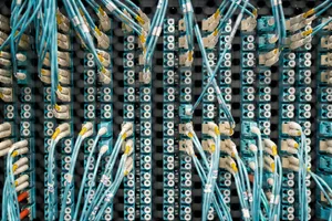 Top view of fiber optic cables connected to ports in modern data server jigsaw puzzle