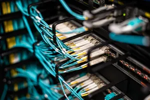 Numerous wires and cables mounted into server patch panel in modern data center jigsaw puzzle