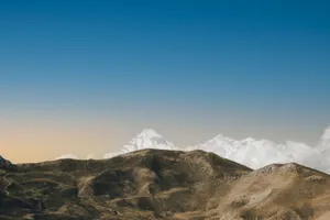 Stunning view of snow-capped peaks in Nepal with clear blue skies. jigsaw puzzle