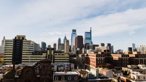 A stunning view of Philadelphia's modern skyline with iconic skyscrapers under a clear blue sky. jigsaw puzzle