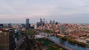 A stunning aerial view of the Philadelphia skyline with clear skies, capturing the cityscape and urban development. jigsaw puzzle