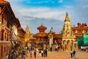 Explore the vibrant architecture and bustling life of Bhaktapur Durbar Square, Nepal in daylight. jigsaw puzzle