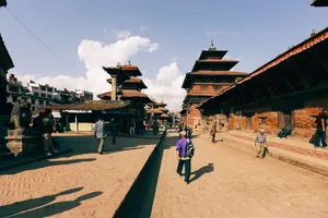 Explore the lively Bhaktapur Durbar Square with its stunning temples and strolling pedestrians. jigsaw puzzle