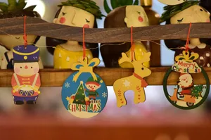 Festive Christmas decorations with soldier, elf, reindeer, and Santa Claus ornaments. jigsaw puzzle
