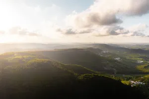 Aerial landscape of lush green hills and valleys near Gradil, Lisbon at sunset. jigsaw puzzle
