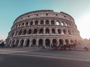 Wide-angle view of the iconic Colosseum in Rome, Lazio, Italy on a bright day. jigsaw puzzle
