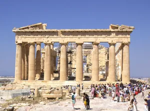 Tourists exploring the iconic Parthenon in Athens, Greece under a bright summer sky. jigsaw puzzle