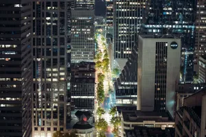 A vibrant nighttime view of Seattle's downtown skyline featuring illuminated skyscrapers. jigsaw puzzle
