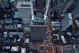 Stunning aerial shot of Chicago's cityscape featuring towering skyscrapers during twilight. jigsaw puzzle