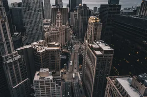 Discover the majestic skyscrapers and urban streets of downtown Chicago in this stunning aerial cityscape. jigsaw puzzle