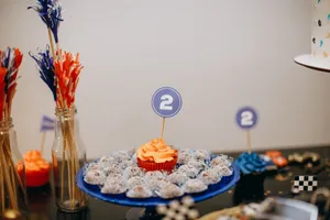 Vibrant birthday party table with cupcakes and festive decor in red and blue theme. jigsaw puzzle