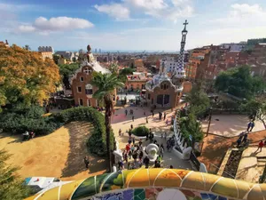 Aerial view of Park Güell in Barcelona, showcasing colorful architecture and cityscape. jigsaw puzzle