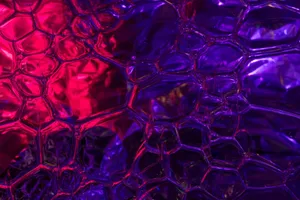 Explore a dynamic array of neon hues with intricate patterns creating a captivating abstract texture. jigsaw puzzle