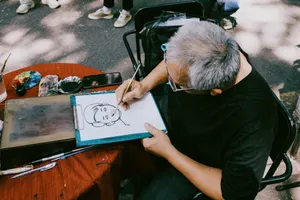 A skilled street artist drawing a portrait in an urban outdoor setting, capturing creativity and talent. jigsaw puzzle