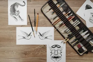 Flat lay of tattoo design sketches and art supplies for artistic inspiration and creativity. jigsaw puzzle