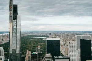 From above of contemporary buildings located near central park with green vegetate on Manhattan in New York city against cloudy sky jigsaw puzzle