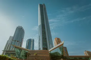 View of impressive skyscrapers in Dubai, showcasing modern architecture under a clear blue sky. jigsaw puzzle