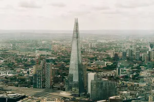 Stunning aerial view of The Shard and London's urban skyline on a cloudy day. jigsaw puzzle