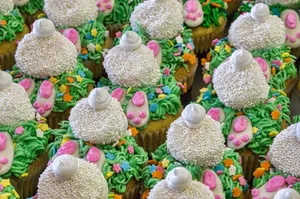 Close-up of playful Easter bunny tail cupcakes in a vibrant spring theme. jigsaw puzzle