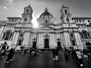 Stunning black and white photo of Sant'Agnese in Agone church in Rome with tourists outside. jigsaw puzzle