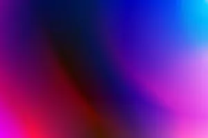 A vivid abstract gradient featuring bold pink, purple, and blue hues. jigsaw puzzle