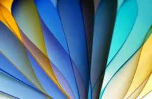 Vibrant abstract composition of multicolored paper folds, creating a dynamic visual effect. jigsaw puzzle