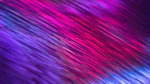 Dynamic pink and purple light streaks creating a vibrant abstract background. jigsaw puzzle