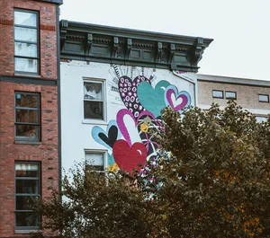 Vibrant street art mural with heart motifs on a New York building facade. jigsaw puzzle