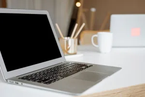A sleek laptop on a modern office desk, ideal for remote work or business environments. jigsaw puzzle