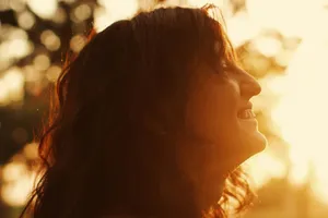 Profile of a smiling woman in warm sunset light with bokeh background. jigsaw puzzle