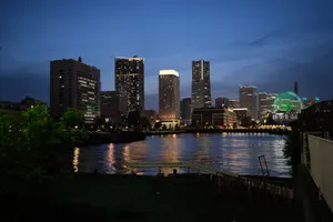 Beautiful view of Yokohama city lights reflecting on the water during twilight. jigsaw puzzle