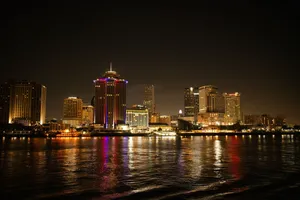 Captivating night shot of New Orleans skyline reflecting on the Mississippi River. jigsaw puzzle