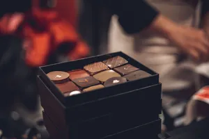 Elegant box of assorted chocolates in a soft focus setting, perfect for gourmet and special gifts. jigsaw puzzle